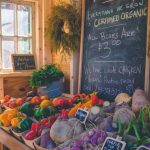 Local Food - variety of vegetables display with Certified Organic signage