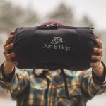 Sleeping Gear - person holding Jon & Hop bag