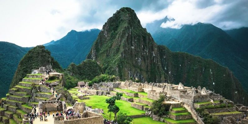 Machu Picchu - green mountain under white cloudy sky during daytime
