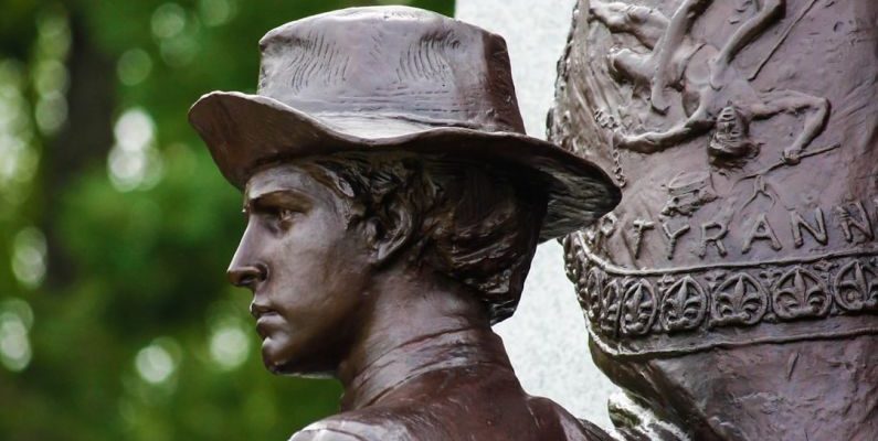 Gettysburg Battlefield - a close up of a statue of a man wearing a hat