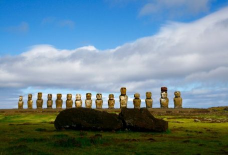 Moai Easter - gray rock formation under white clouds and blue sky during daytime