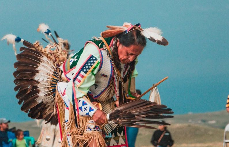 Native American - man wearing headdress