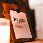 Hygge Lifestyle - brown wooden frame with white and black love print