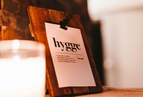 Hygge Lifestyle - brown wooden frame with white and black love print
