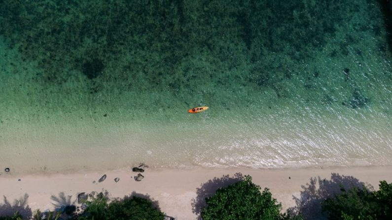 Kayaking Fiji - an aerial view of a beach with a kayak