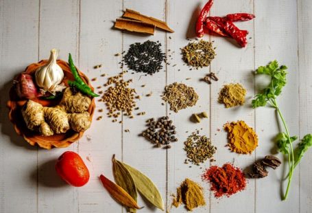 Indian Spices - a variety of spices on a white table