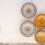 Moroccan Cuisine - six assorted-color plate on white surface