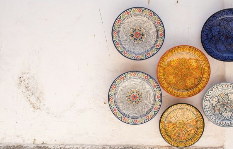 Moroccan Cuisine - six assorted-color plate on white surface