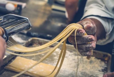 Italian Pasta - person sheeting dough