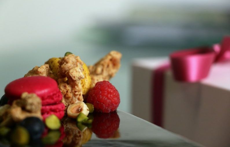 Exquisite Desserts - a close up of a plate of food with raspberries